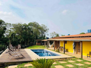 Recanto com piscina Aquecida e uma bela vista